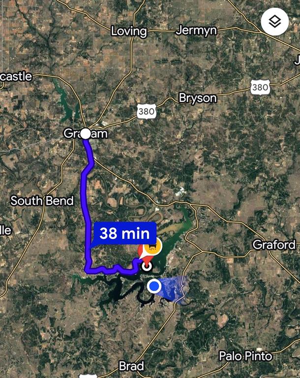 137 White Moon Road Graham, TX 76450 - Photo 15 of 15 a street sign that is sitting on a brick wall