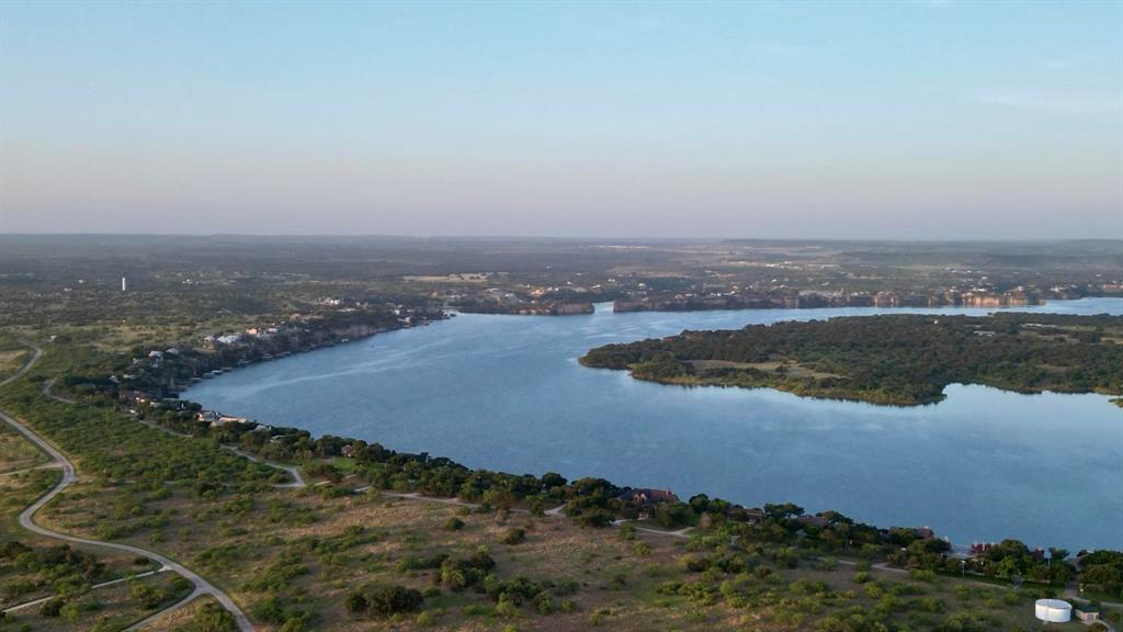 137 White Moon Road Graham, TX 76450 - Photo 19 of 24 an aerial view of a houses with a lake view