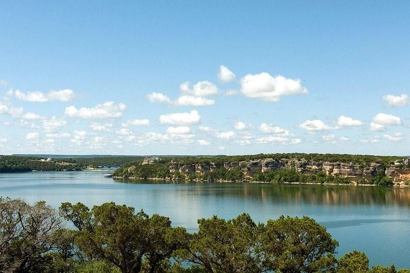 137 White Moon Road Graham, TX 76450 - Photo 21 of 24 a view of a lake and a mountain