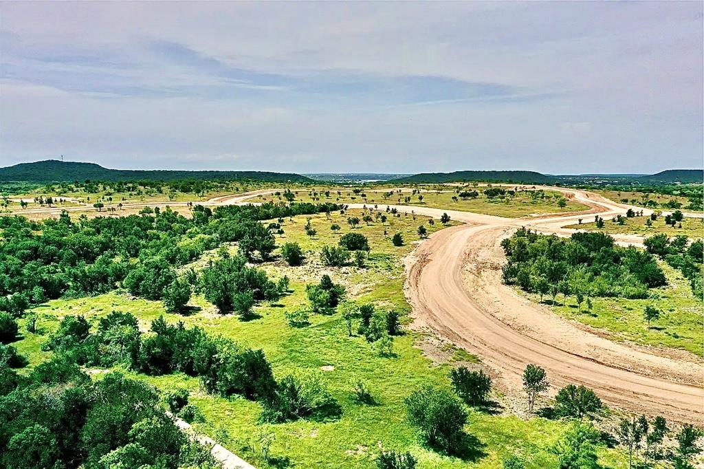137 White Moon Road Graham, TX 76450 - Photo 4 of 15 a view of a swimming pool and an ocean view
