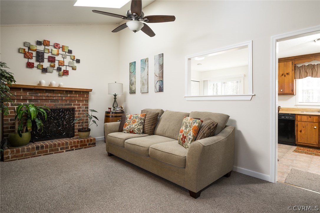 13331 Bailey Bridge Road Midlothian, VA 23112 - Photo 7 of 21 a living room with furniture a fireplace and a flat screen tv
