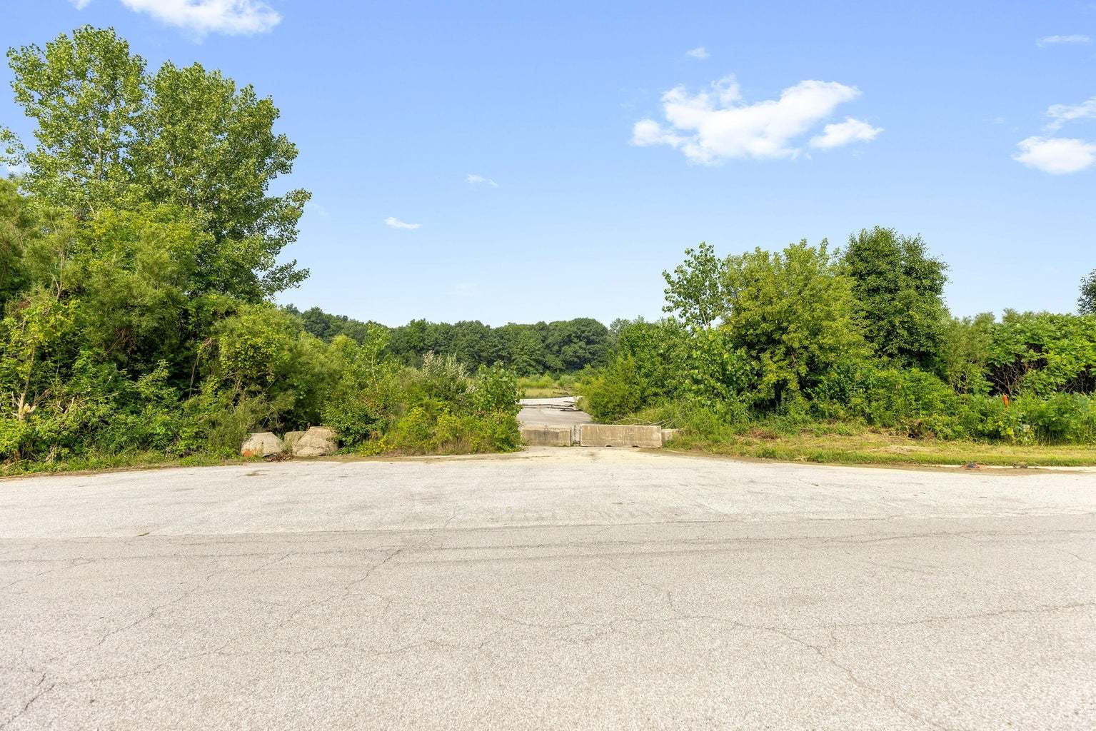 10470 Doubletree Drive South Winfield, IN 46307 - Photo 25 of 30 a wooden bench with trees in the background