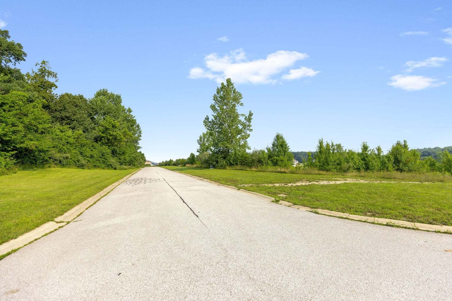 10470 Doubletree Drive South Winfield, IN 46307 - Photo 26 of 30 a view of a golf course with a lake
