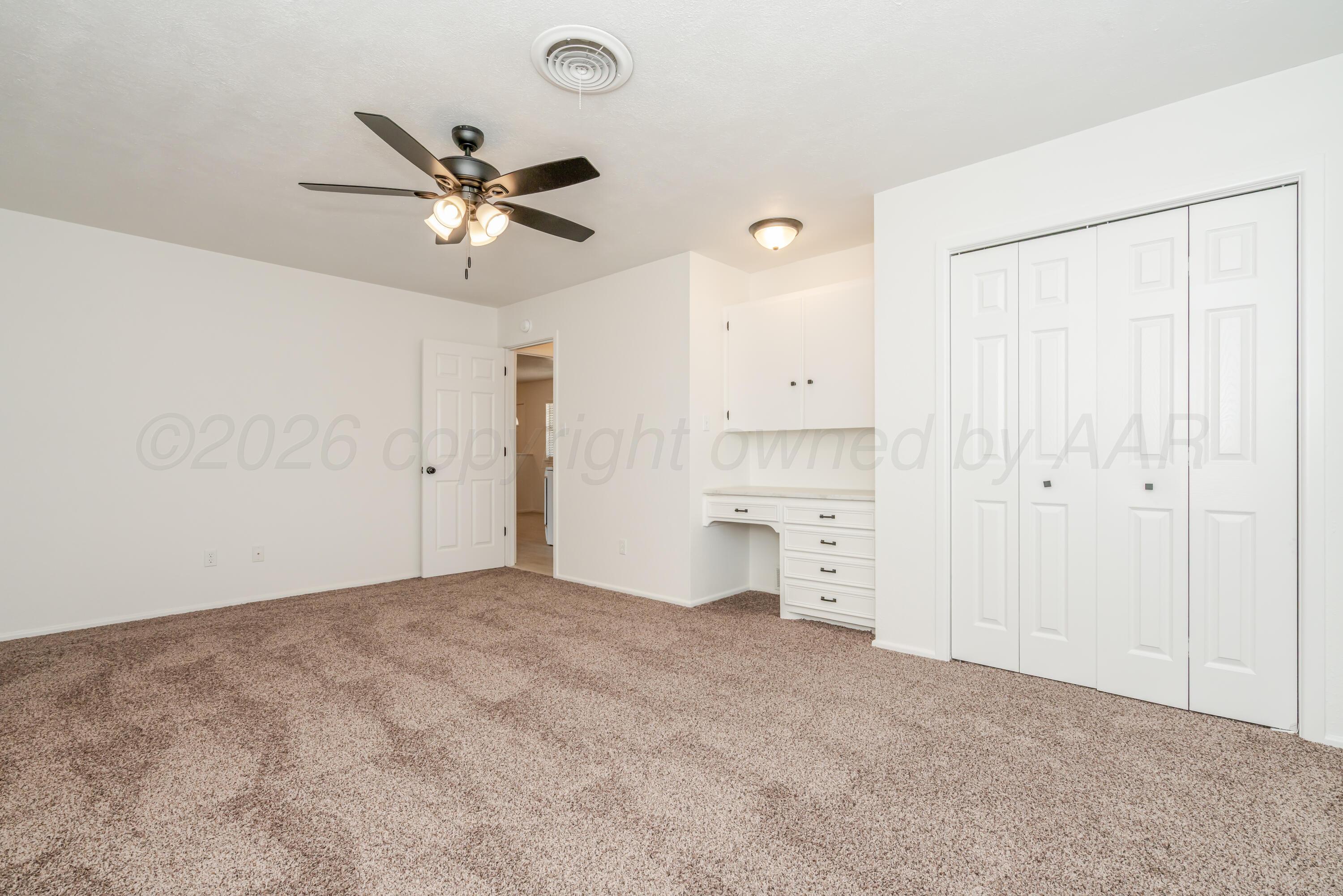 1001 5th Street Canyon, TX 79015 - Photo 17 of 34 a view of a kitchen with a sink and cabinets
