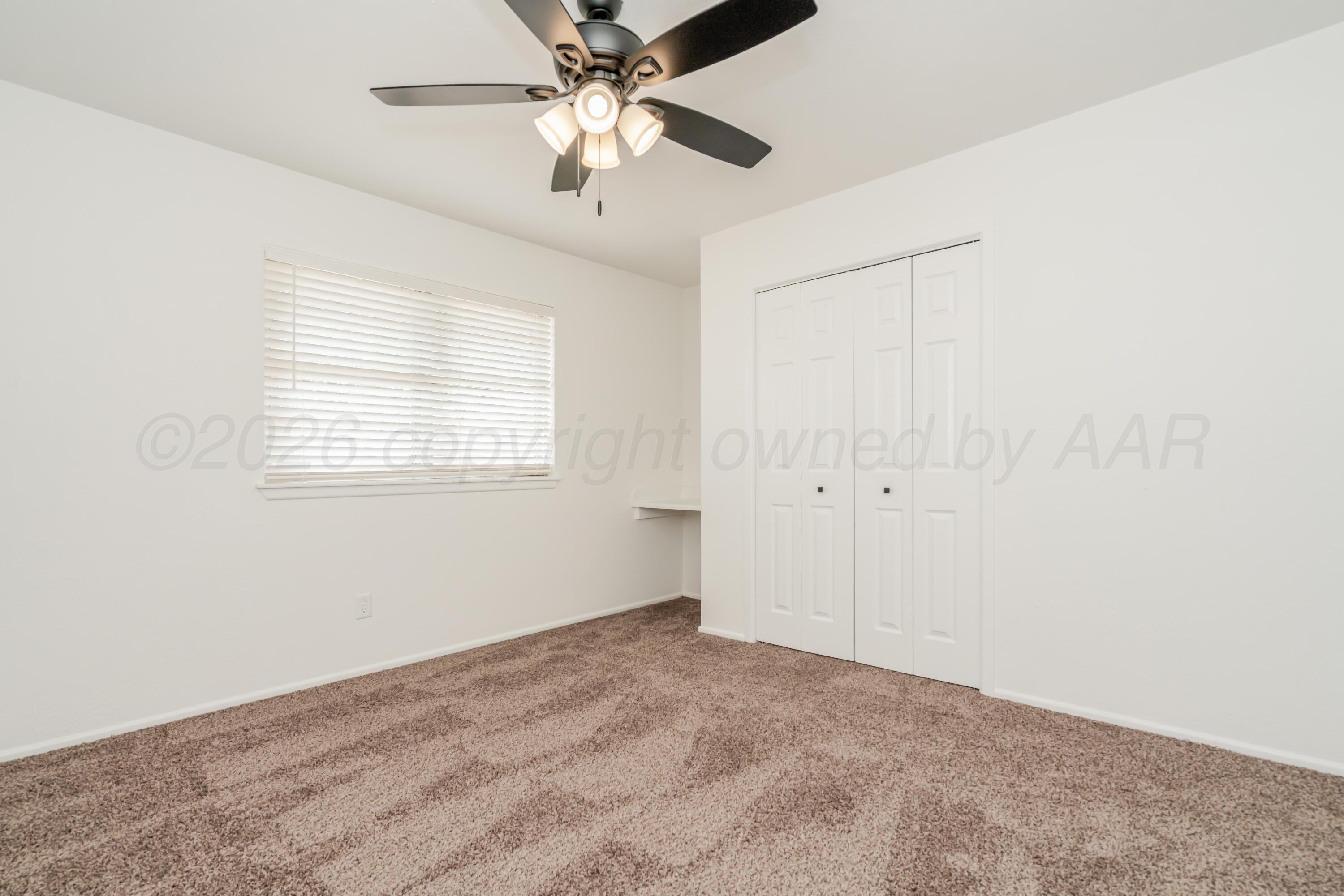 1001 5th Street Canyon, TX 79015 - Photo 23 of 34 a view of an empty room with a window