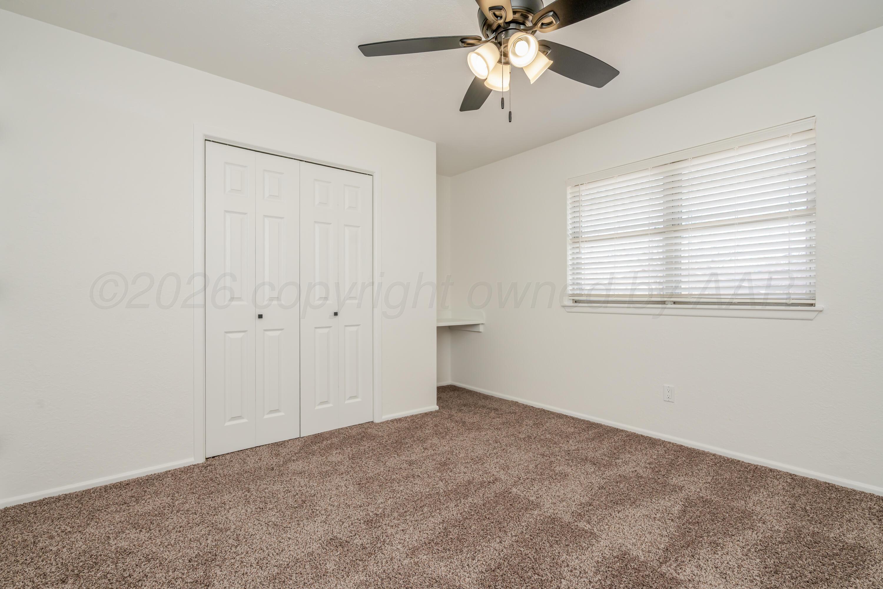 1001 5th Street Canyon, TX 79015 - Photo 30 of 34 a view of an empty room with a window