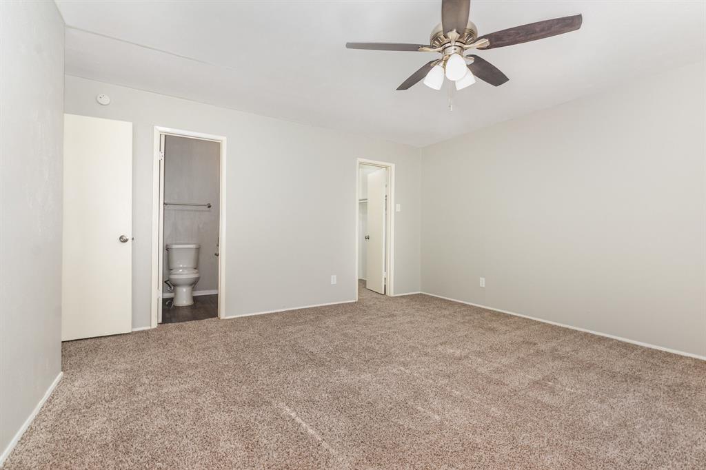 1108 Overdowns Drive Plano, TX 75023 - Photo 13 of 20 an empty room with chandelier fan
