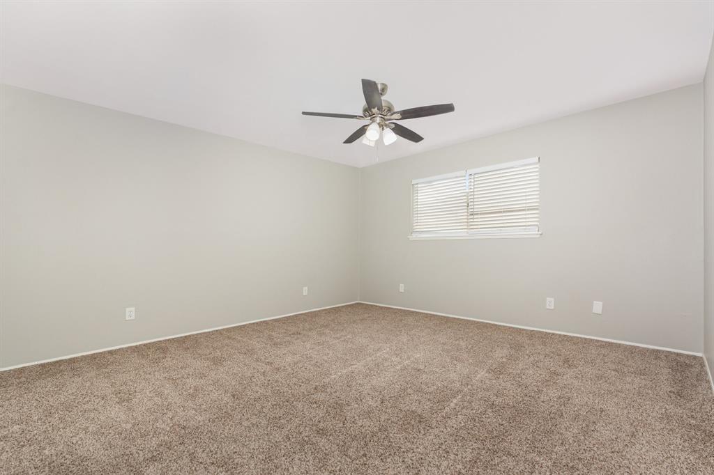 1108 Overdowns Drive Plano, TX 75023 - Photo 16 of 20 a view of room with a ceiling fan and window