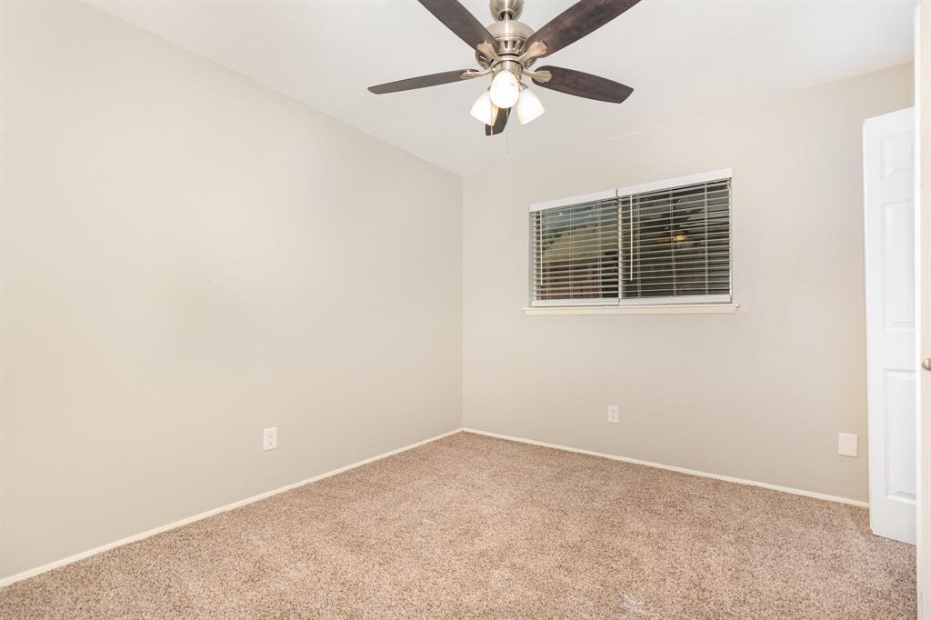 1108 Overdowns Drive Plano, TX 75023 - Photo 17 of 20 an empty room with a window