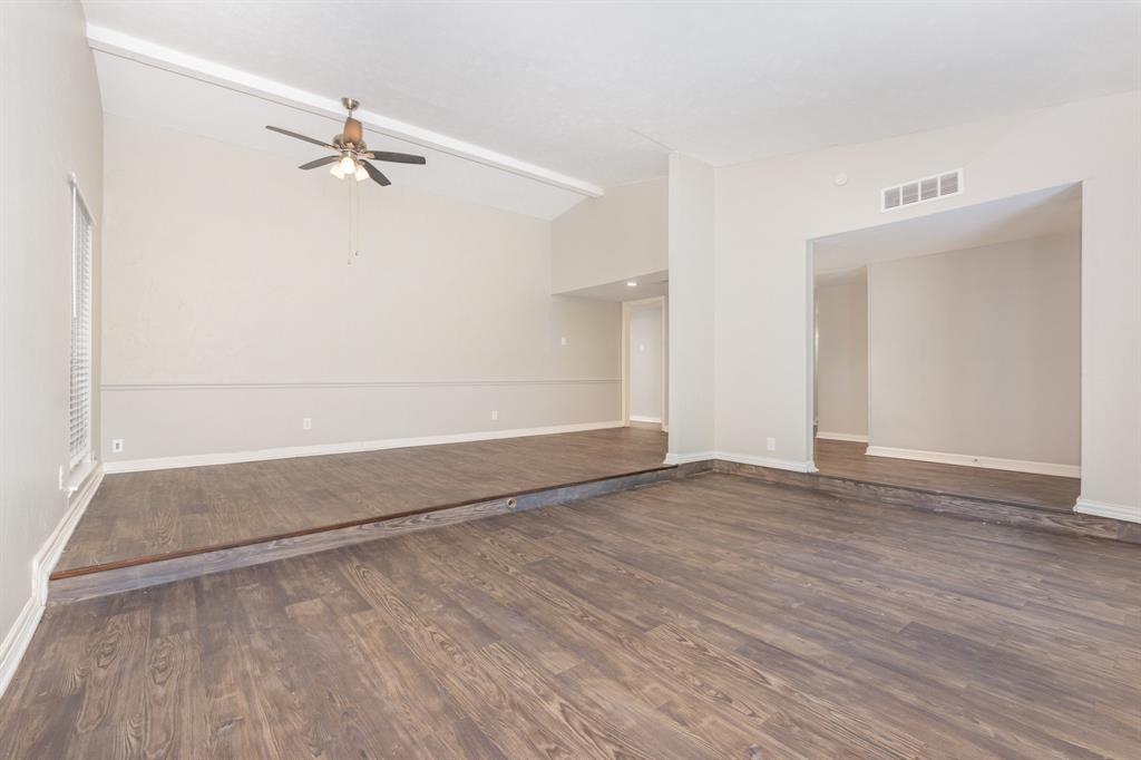1108 Overdowns Drive Plano, TX 75023 - Photo 6 of 20 a view of an empty room with wooden floor