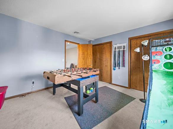 a room with furniture and a window