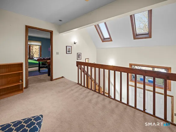 a view of hallway with livingroom