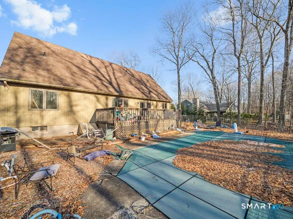 a view of a yard with cars