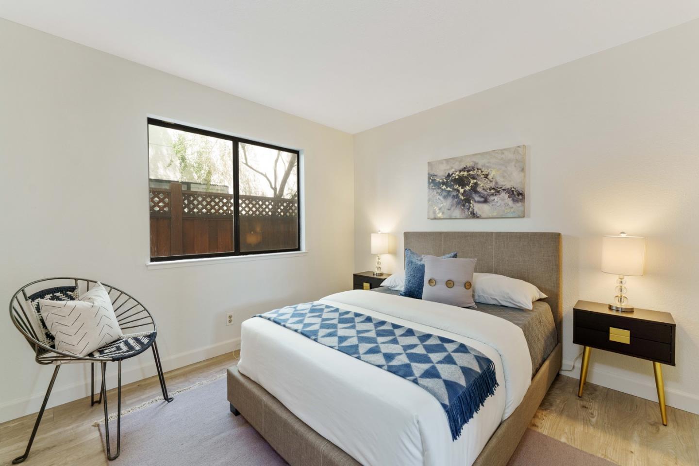 6702 Paseo Catalina Pleasanton, CA 94566 - Photo 19 of 44 a bedroom with a large bed and a window