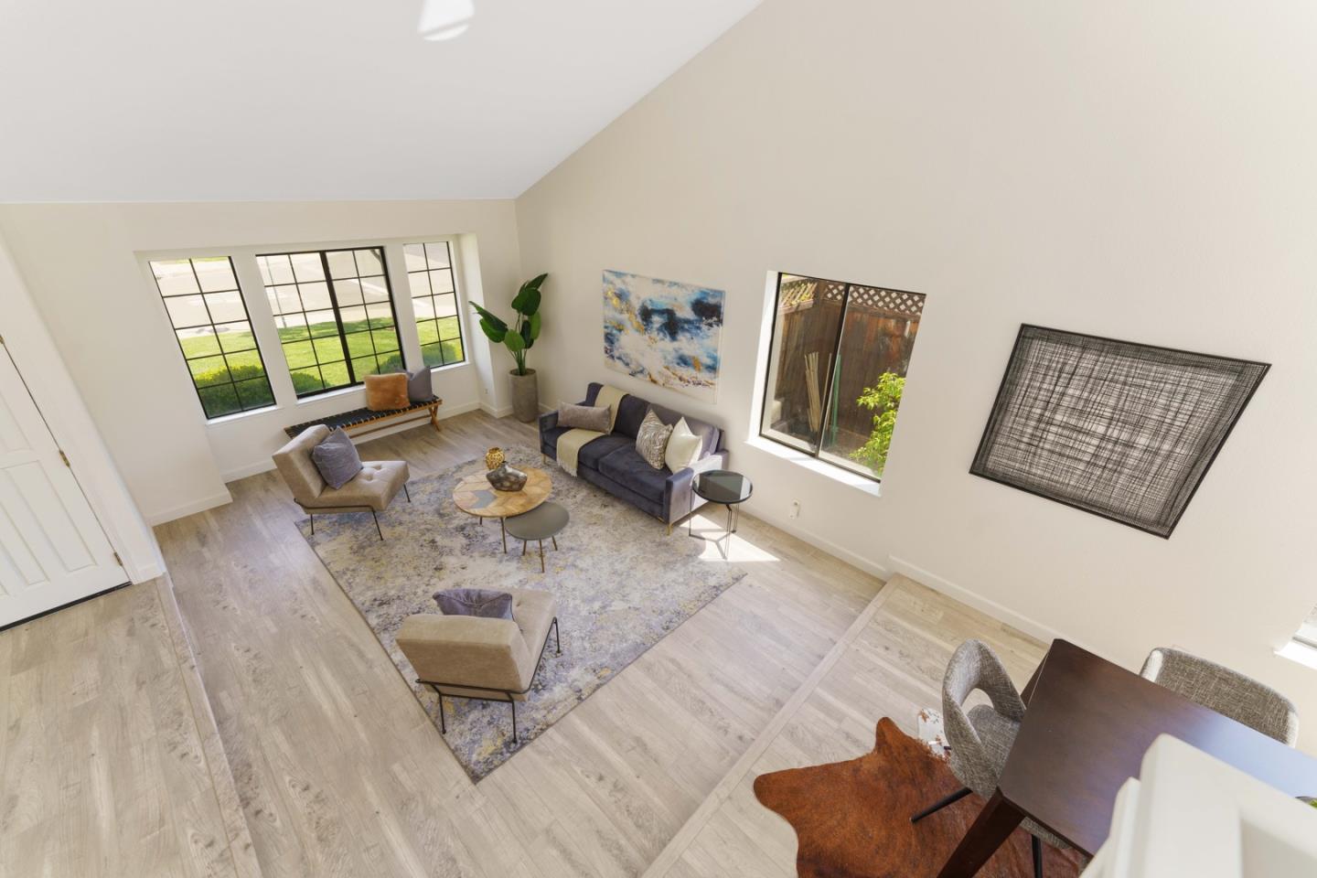 6702 Paseo Catalina Pleasanton, CA 94566 - Photo 22 of 44 a living room with furniture and a large window