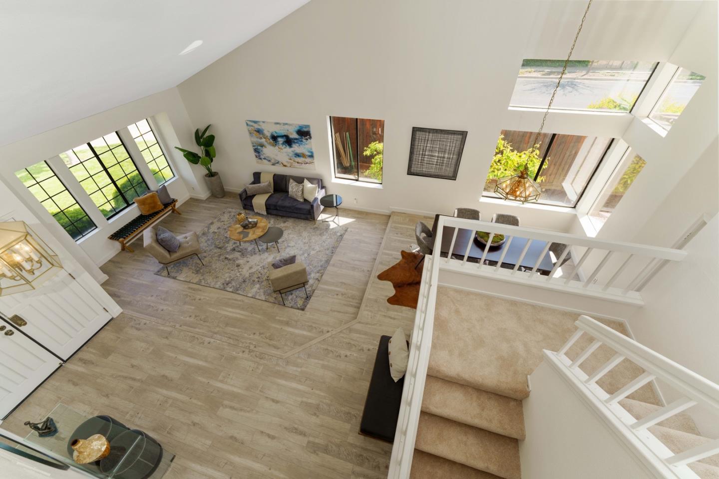 6702 Paseo Catalina Pleasanton, CA 94566 - Photo 23 of 44 a living room with furniture and a wooden floor