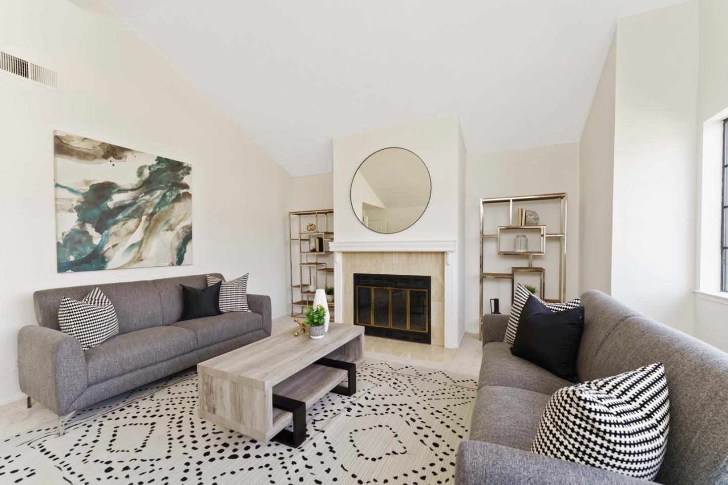 6702 Paseo Catalina Pleasanton, CA 94566 - Photo 30 of 44 a living room with furniture and a fireplace