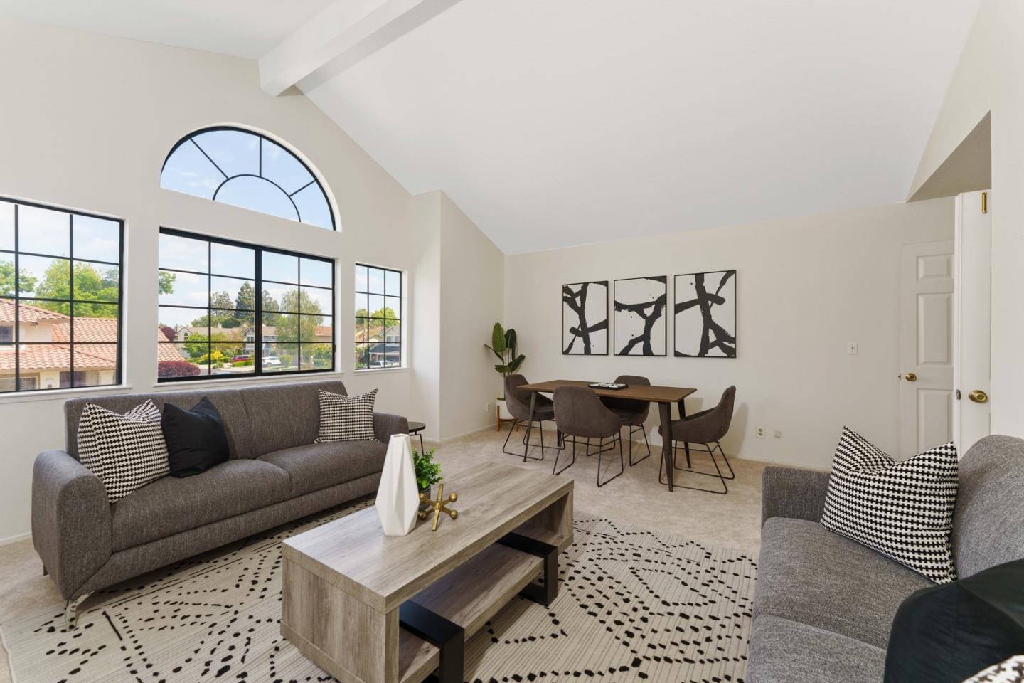 6702 Paseo Catalina Pleasanton, CA 94566 - Photo 31 of 44 a living room with furniture a rug and a large window