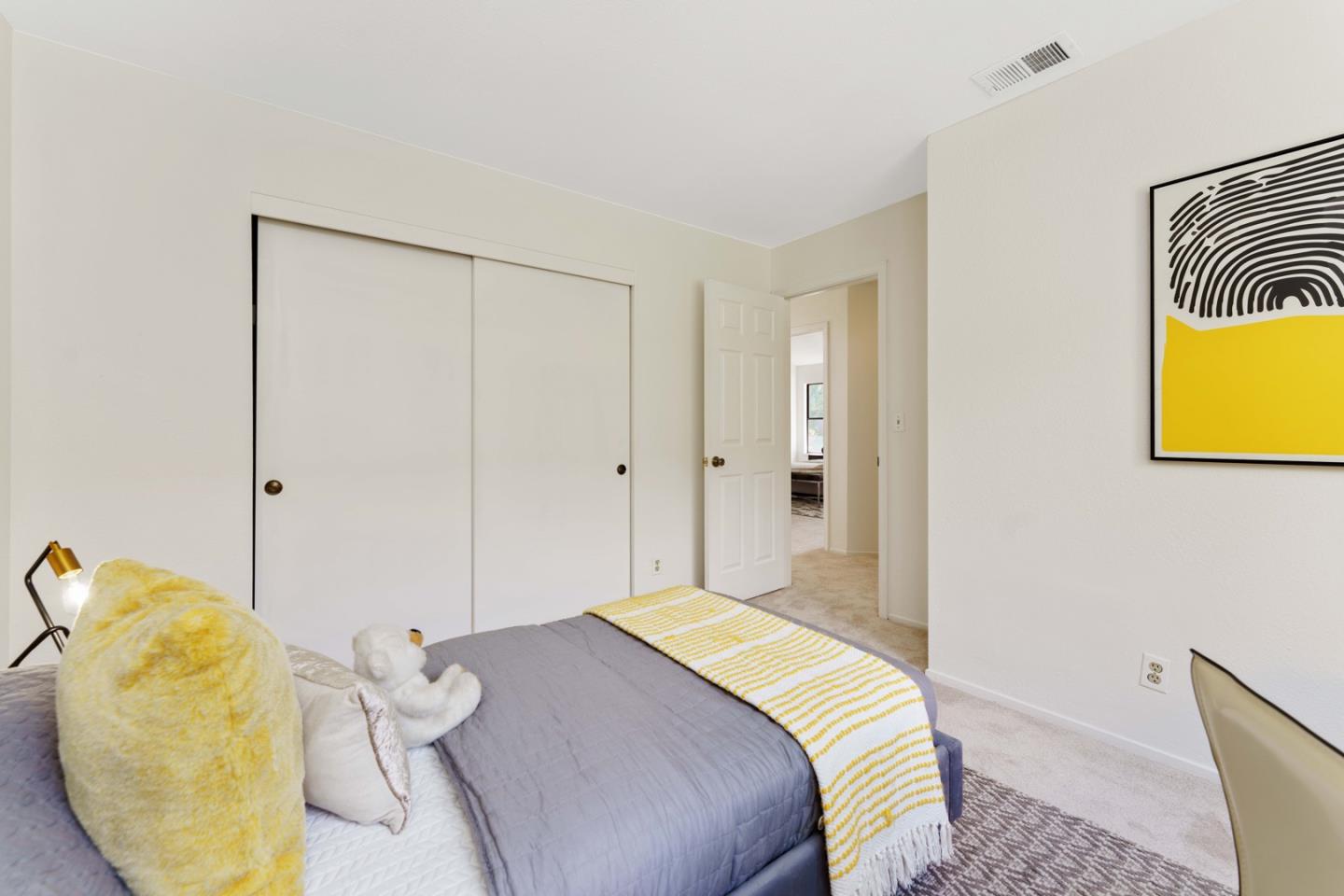 6702 Paseo Catalina Pleasanton, CA 94566 - Photo 33 of 44 a bedroom with a bed and painting on the wall