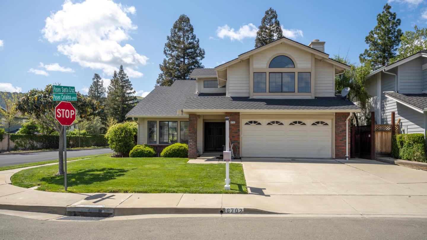 6702 Paseo Catalina Pleasanton, CA 94566 - Photo 5 of 44 a front view of a house with garden