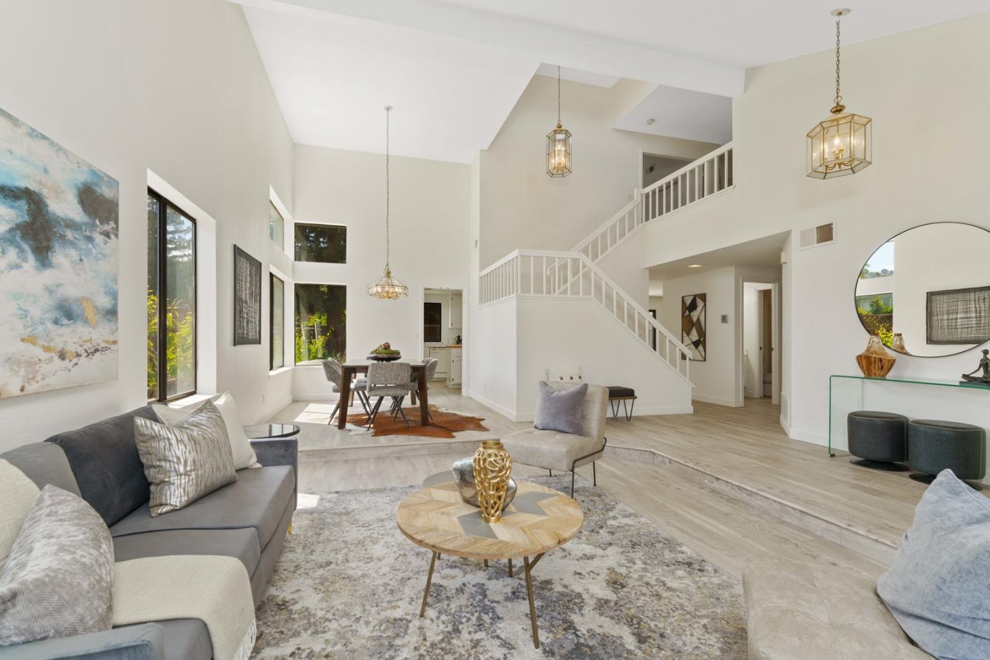 6702 Paseo Catalina Pleasanton, CA 94566 - Photo 10 of 44 a living room with furniture kitchen view and a wooden floor