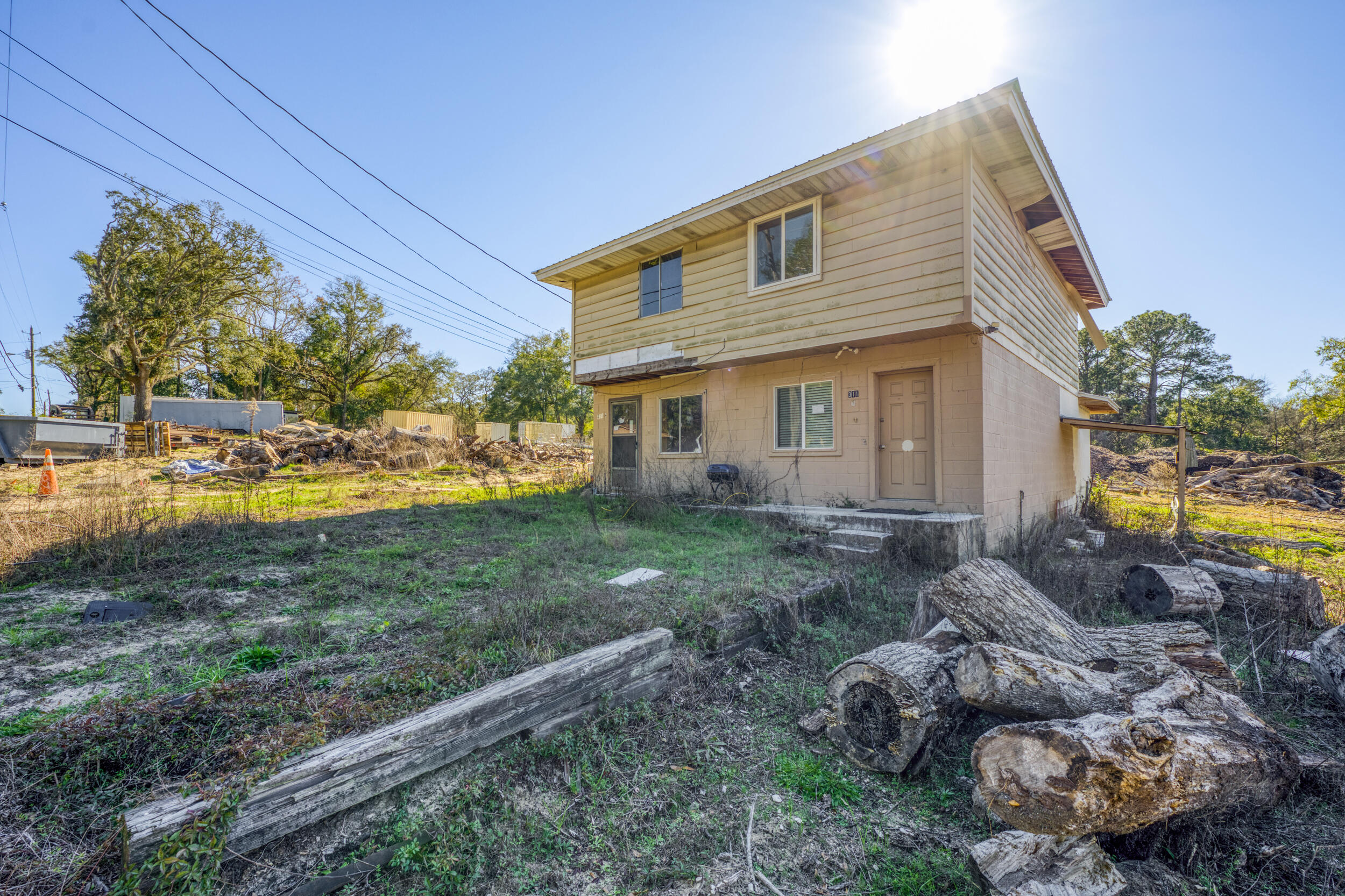 311 Kelly Road Niceville, FL 32578 - Photo 13 of 13 a view of a house with backyard and sitting area