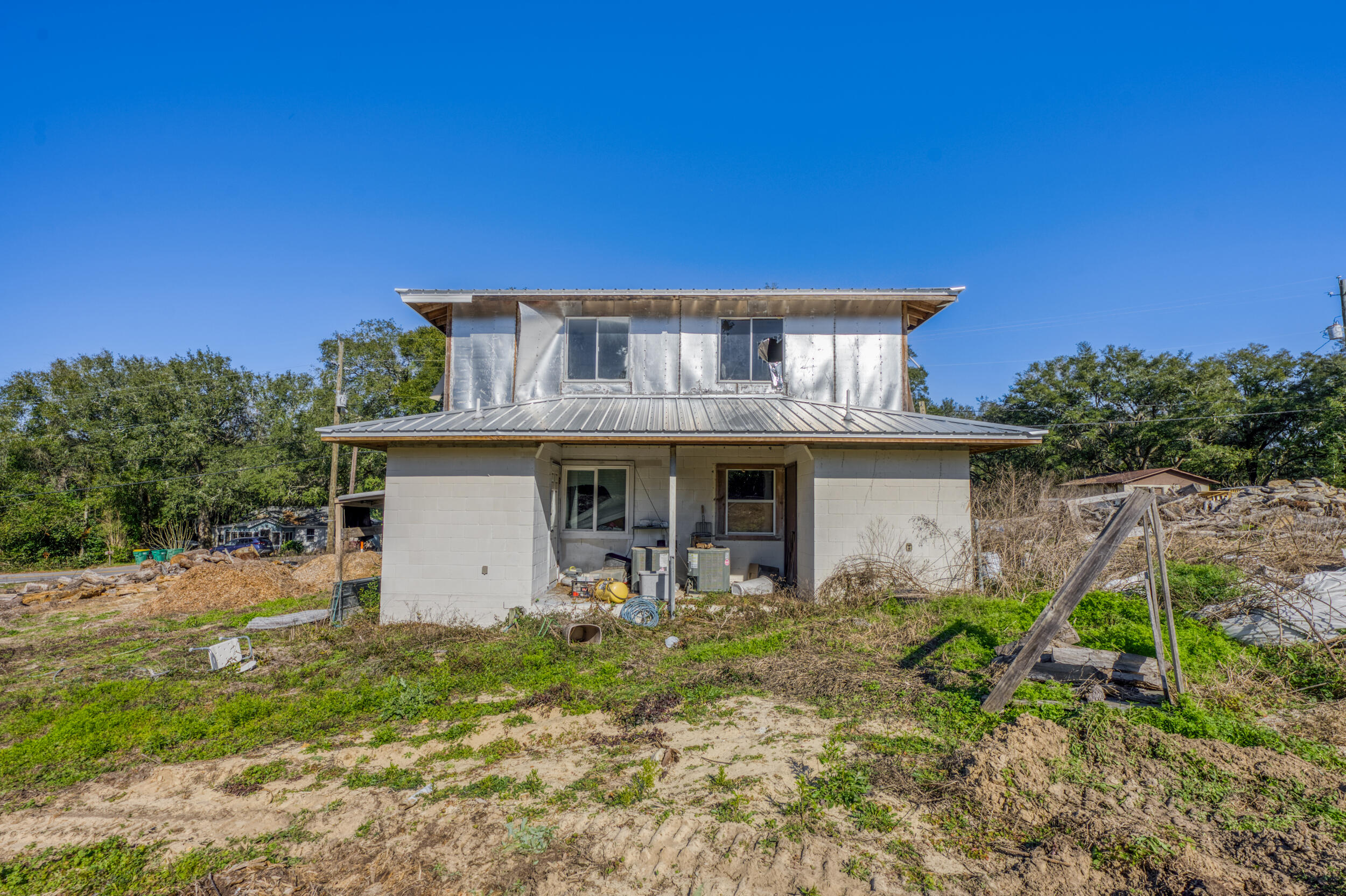 311 Kelly Road Niceville, FL 32578 - Photo 8 of 13 a front view of a house with garden