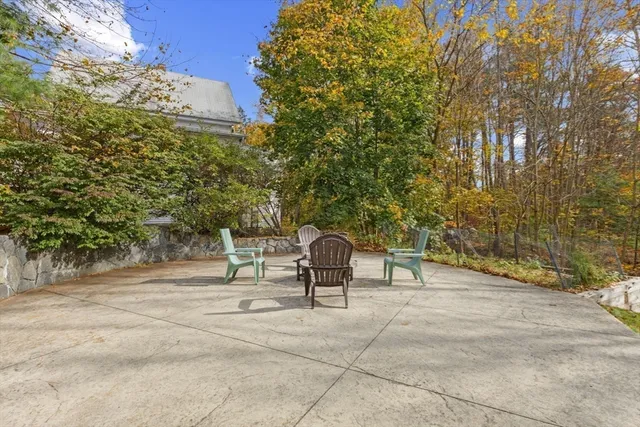 a bench sitting in middle of a yard