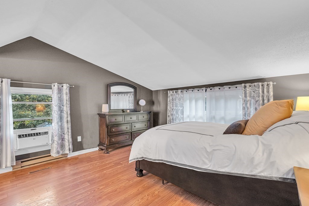 12 Munn Road Monson, MA 01057 - Photo 28 of 40 a bedroom with a large bed and a window