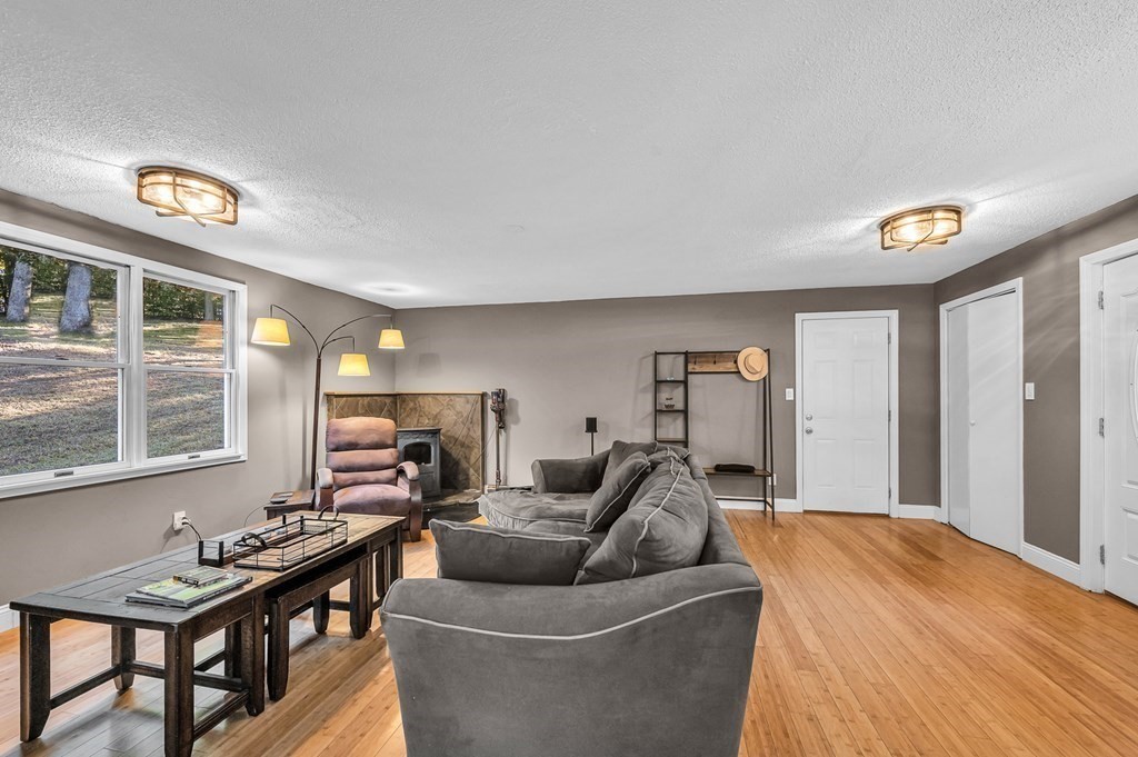 12 Munn Road Monson, MA 01057 - Photo 6 of 40 a living room with furniture and a window