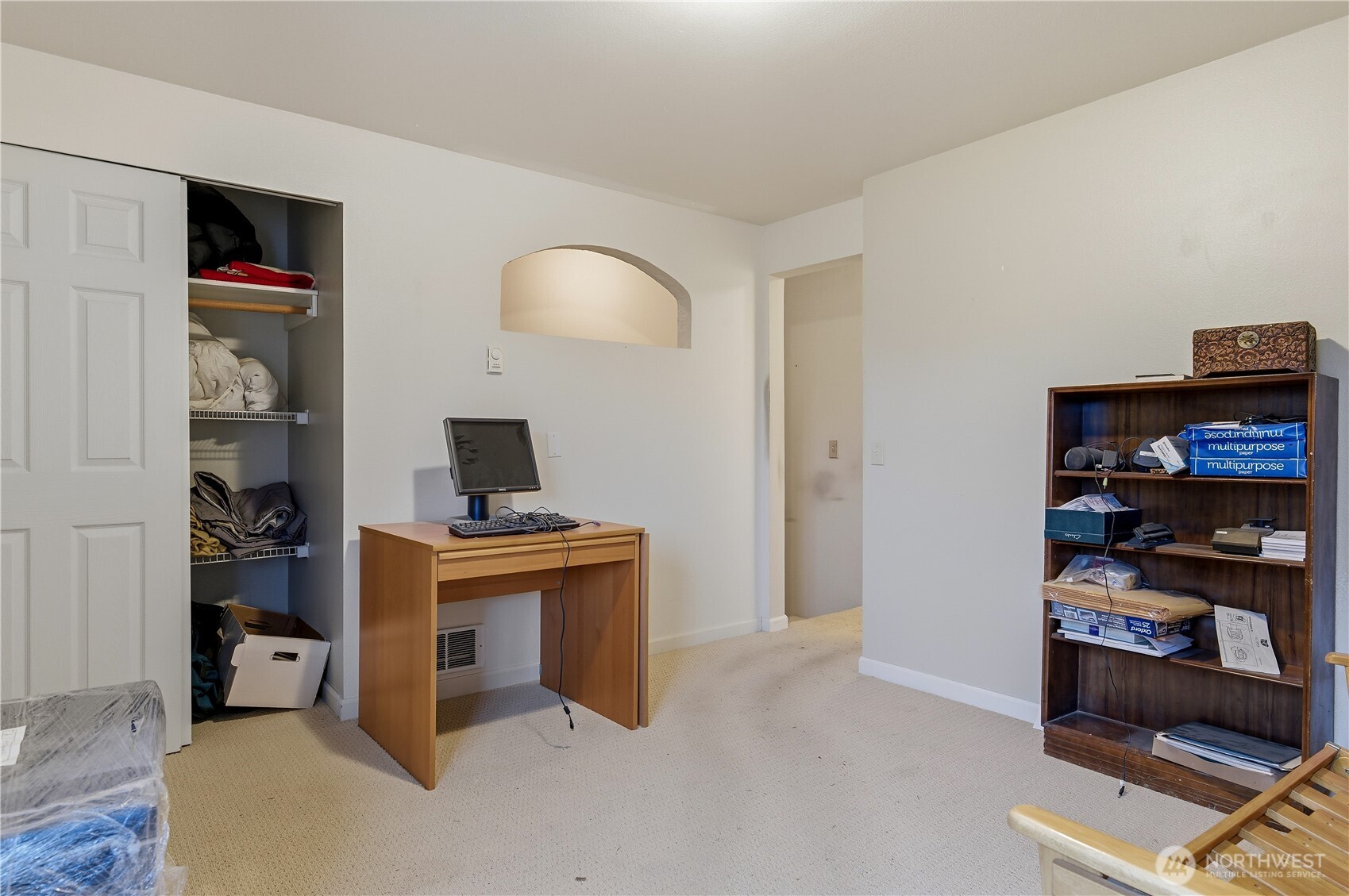 22906 Edmonds Way, Unit 10 Edmonds, WA 98020 - Photo 15 of 19 a workspace with furniture and closet