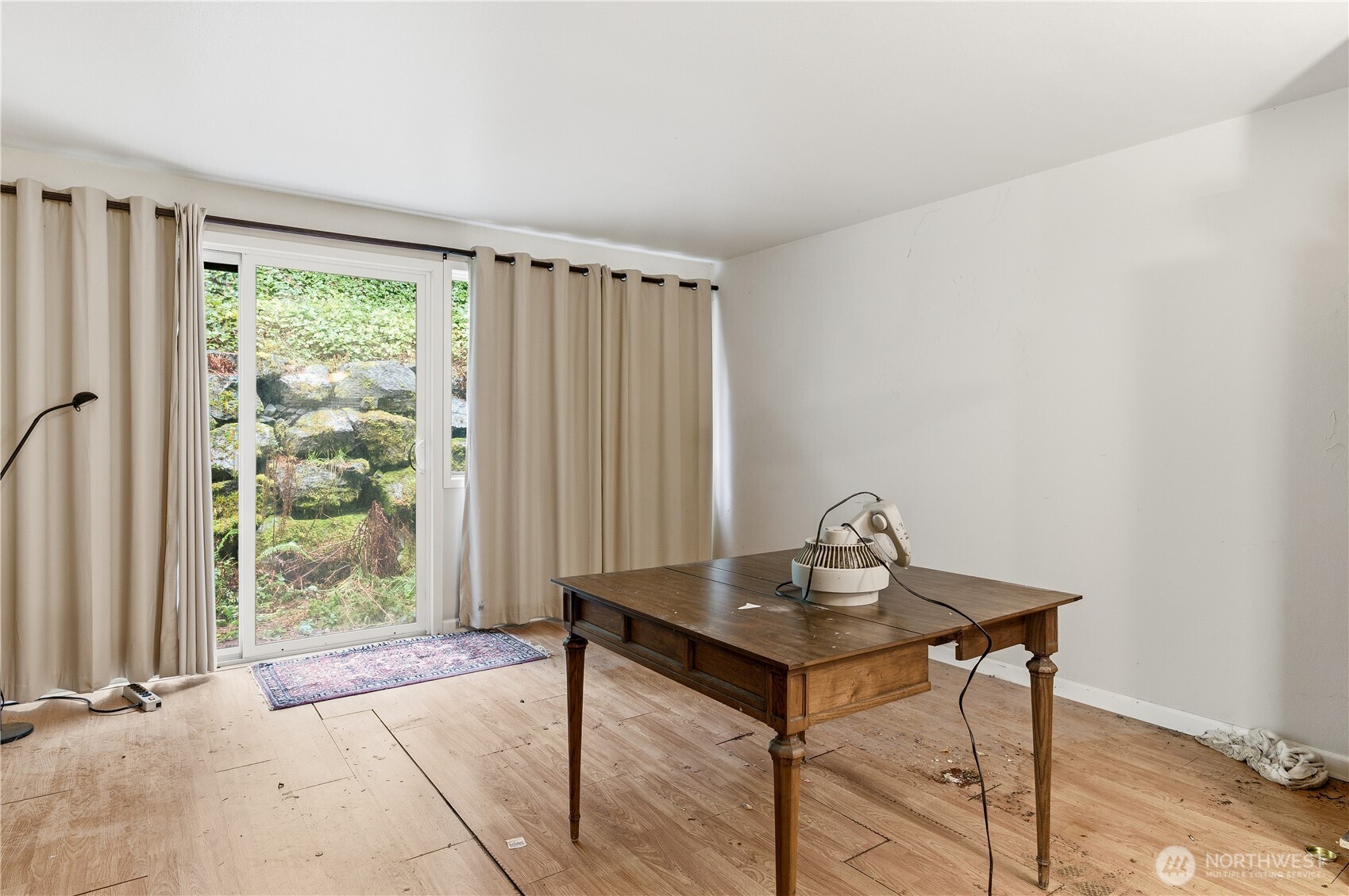 22906 Edmonds Way, Unit 10 Edmonds, WA 98020 - Photo 9 of 19 a view of a workspace with furniture and a window