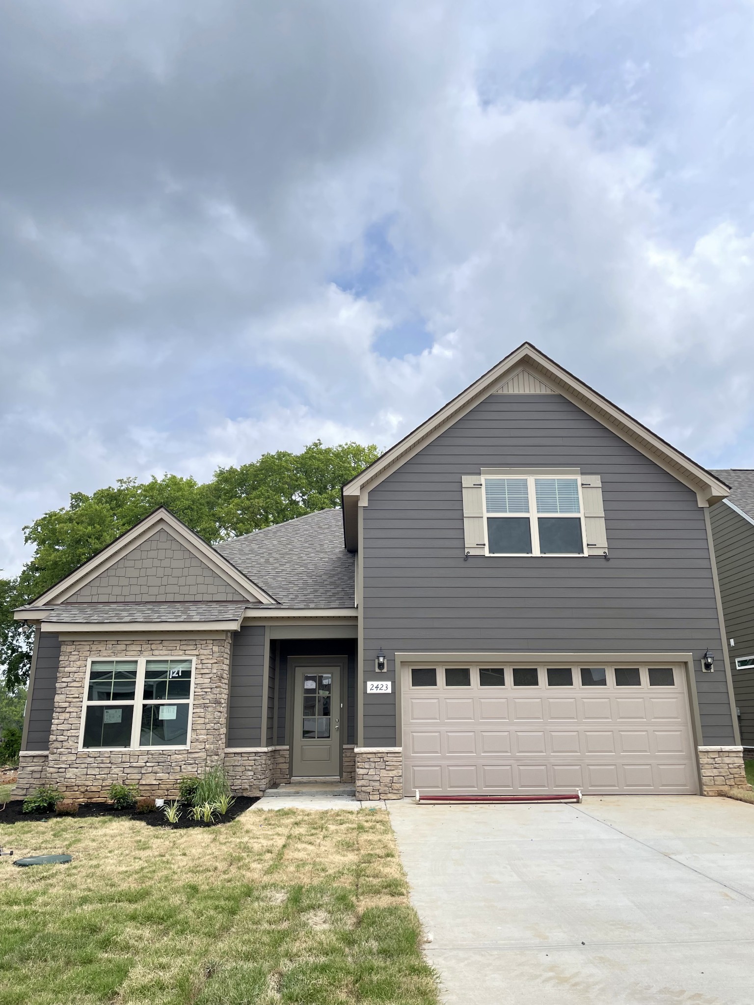2423 Fig Drive Murfreesboro, TN 37127 - Photo 1 of 37 a front view of a house with a yard