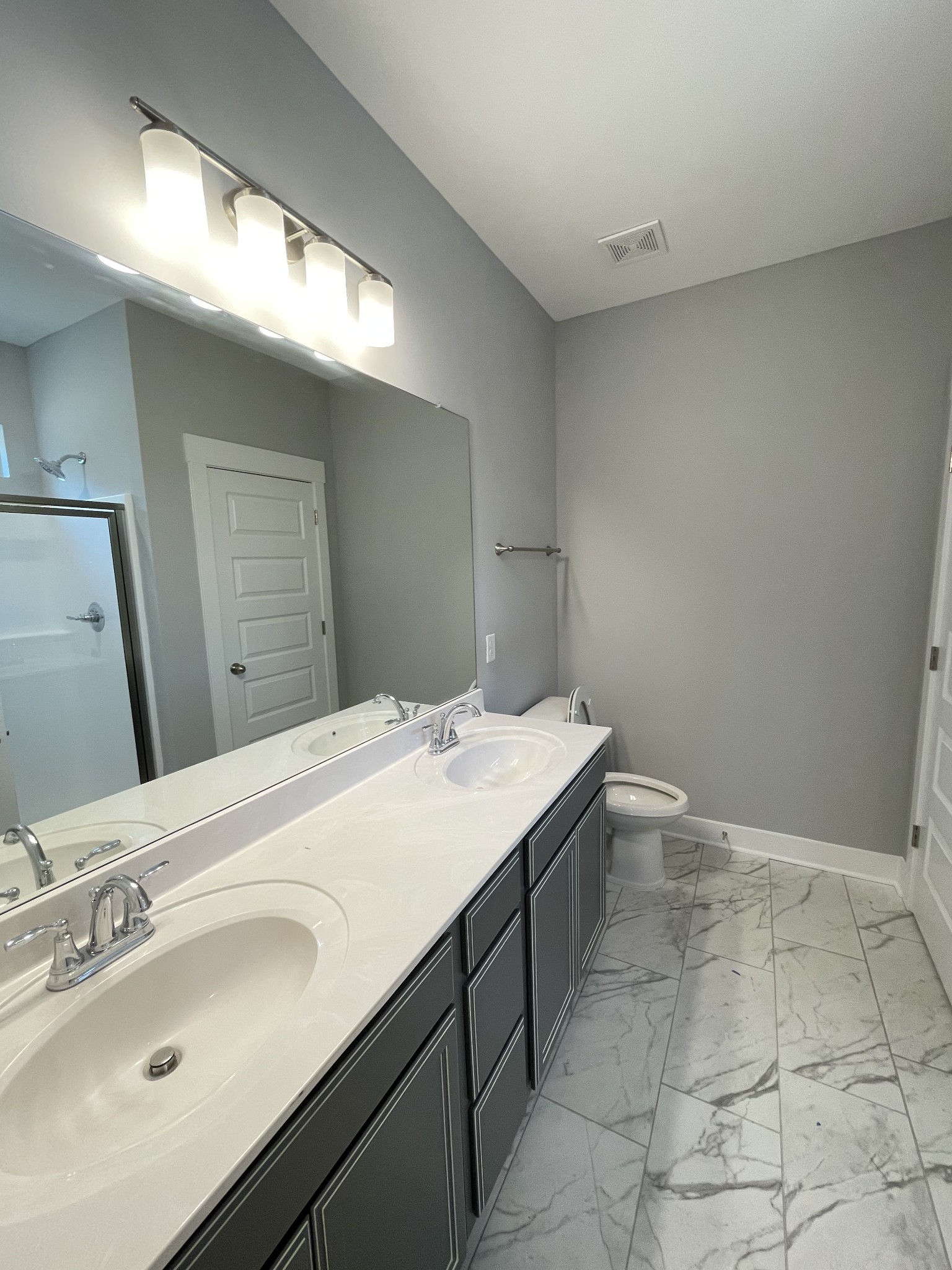 2423 Fig Drive Murfreesboro, TN 37127 - Photo 16 of 37 a bathroom with a sink and a mirror