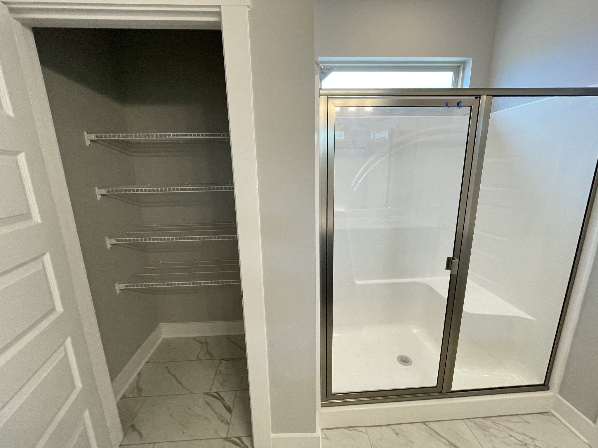 2423 Fig Drive Murfreesboro, TN 37127 - Photo 17 of 37 a bathroom with a glass door shower and vanity