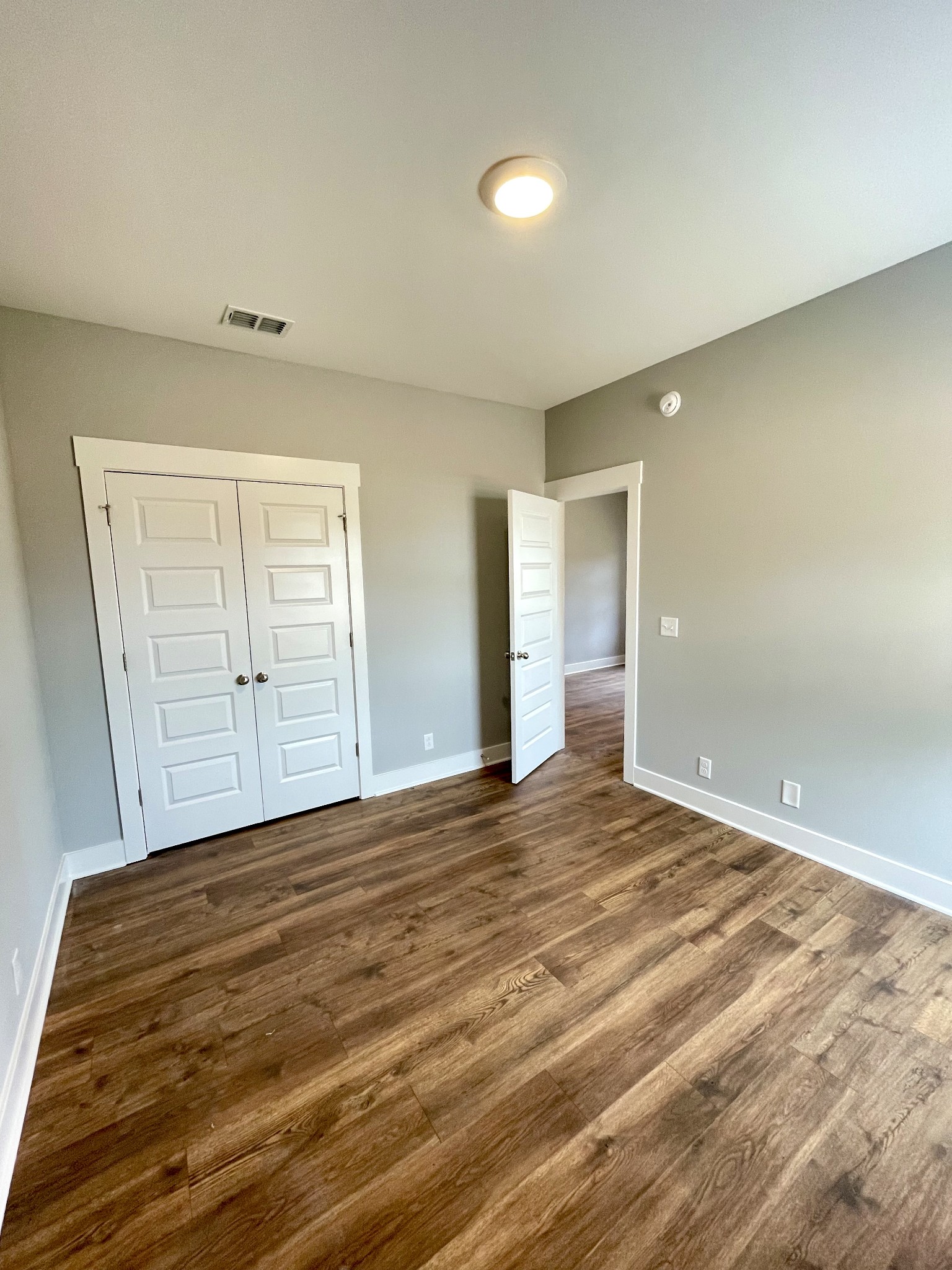 2423 Fig Drive Murfreesboro, TN 37127 - Photo 5 of 37 a view of an empty room with wooden floor and windows