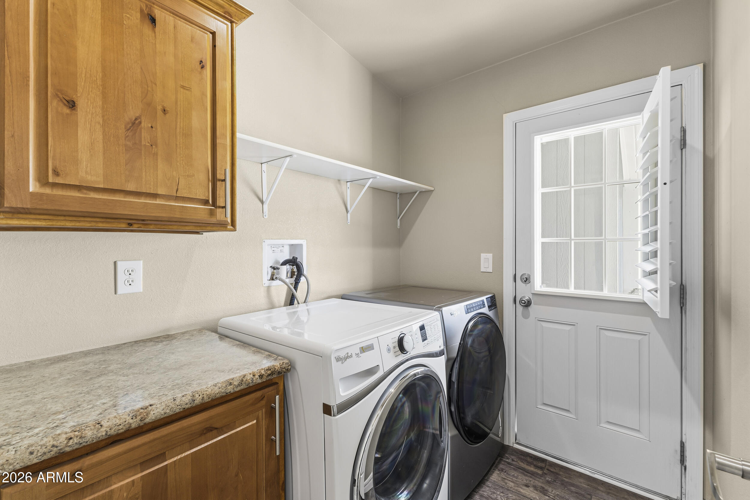 650 North Hawes Road, Unit 3509 Mesa, AZ 85207 - Photo 18 of 43 a utility room with dryer and washer