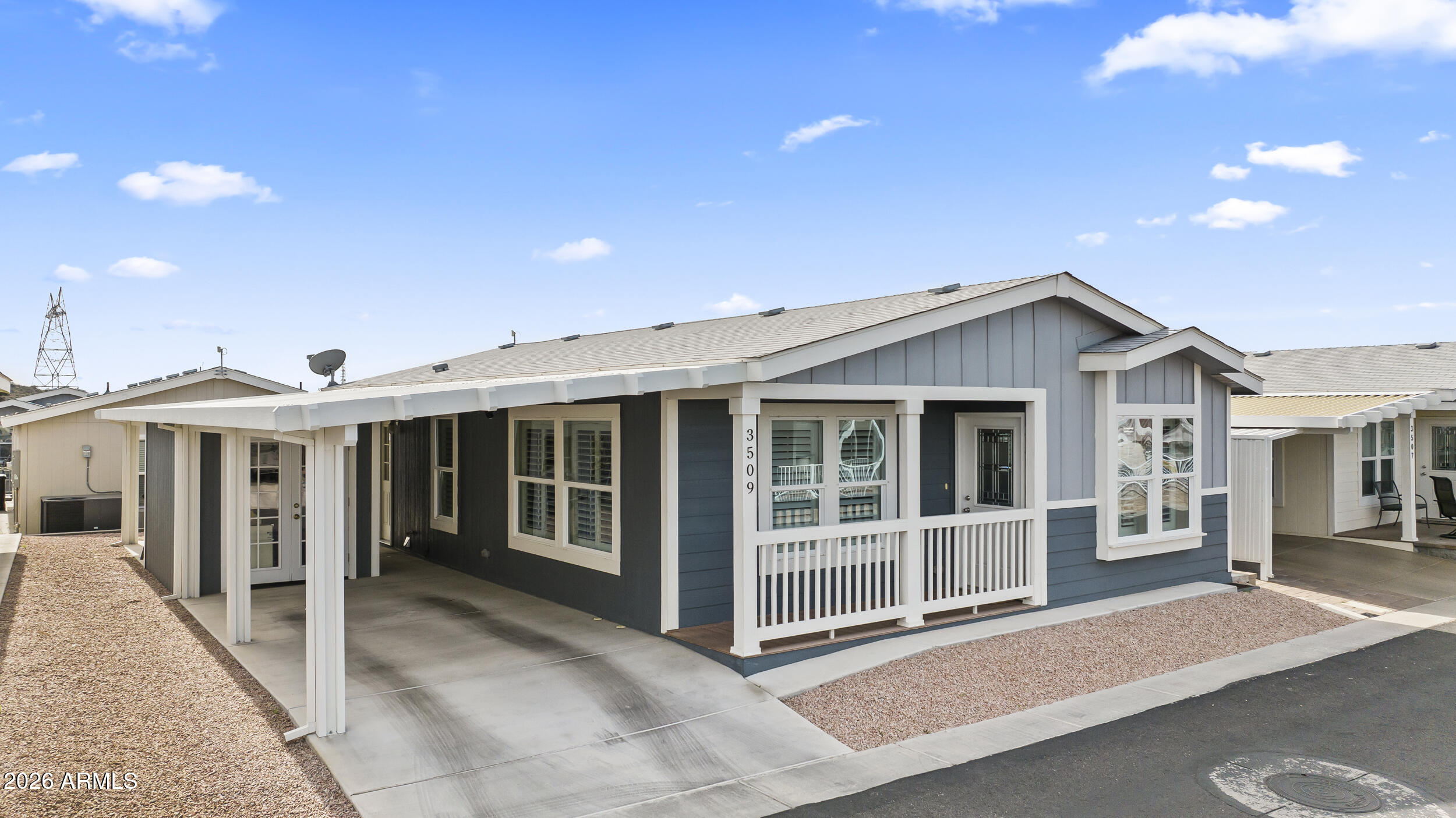 650 North Hawes Road, Unit 3509 Mesa, AZ 85207 - Photo 23 of 43 a view of a house with a outdoor space