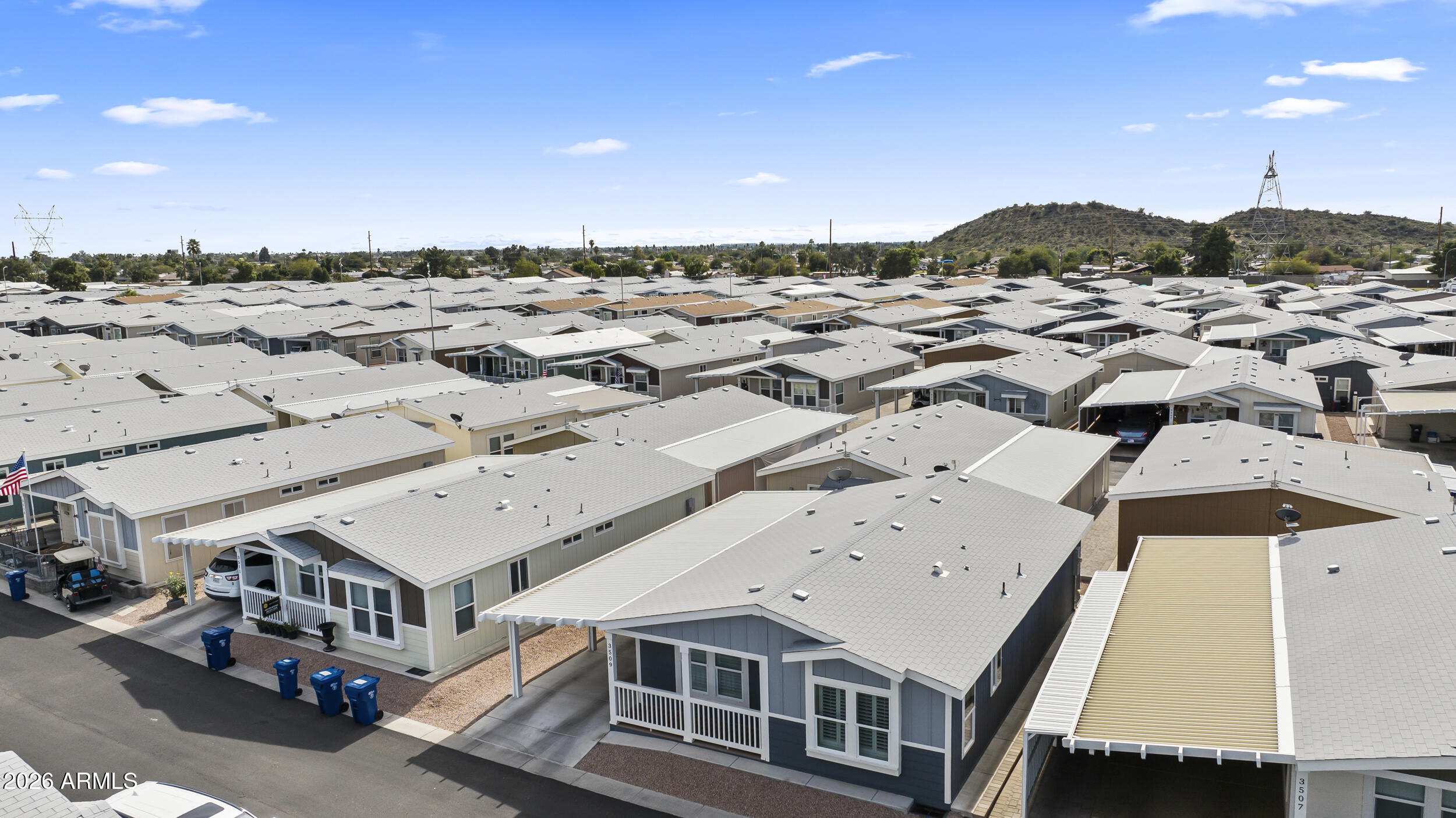 650 North Hawes Road, Unit 3509 Mesa, AZ 85207 - Photo 25 of 43 an aerial view of residential houses with outdoor space