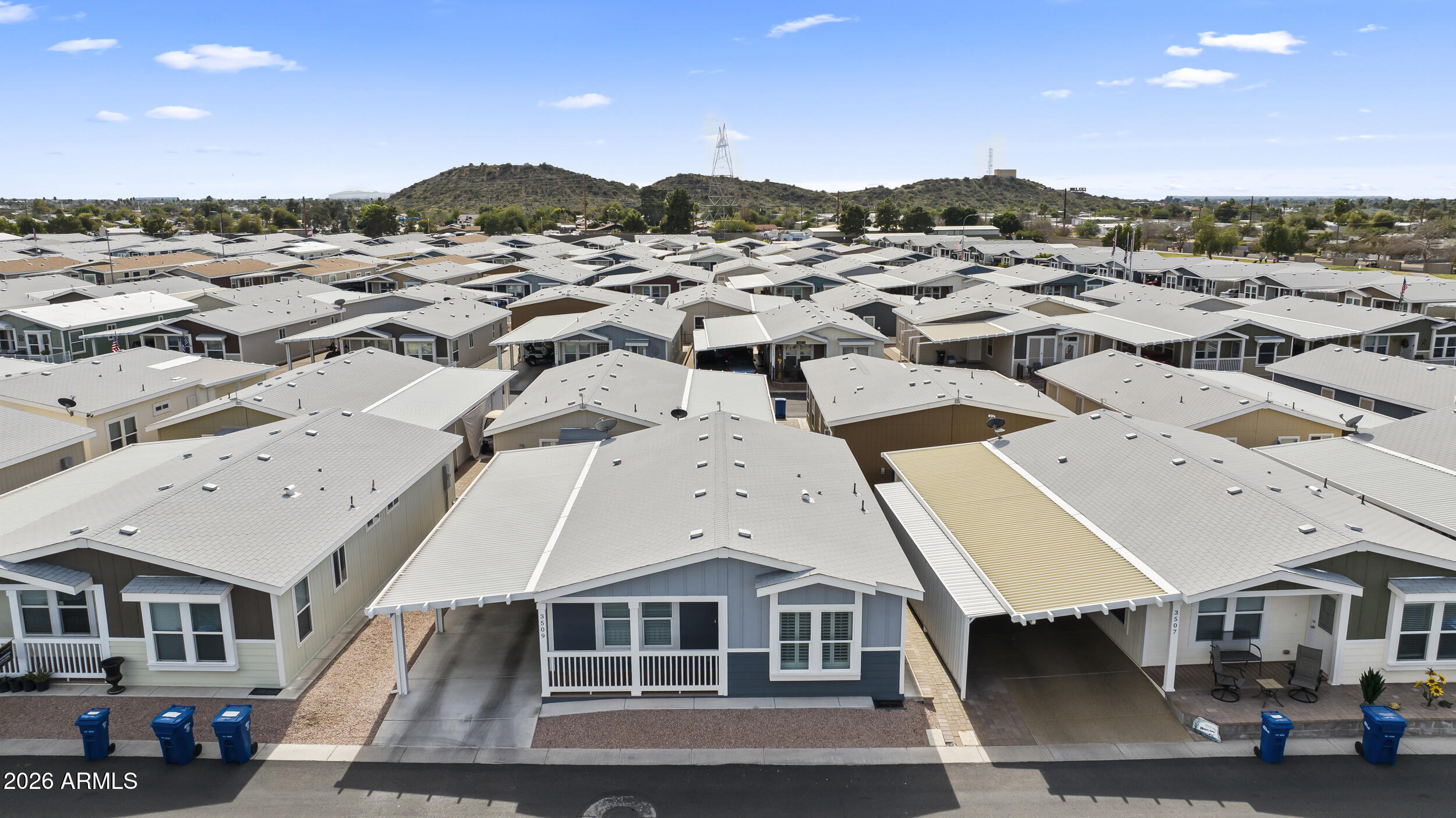 650 North Hawes Road, Unit 3509 Mesa, AZ 85207 - Photo 26 of 43 an aerial view of multiple houses with a city view