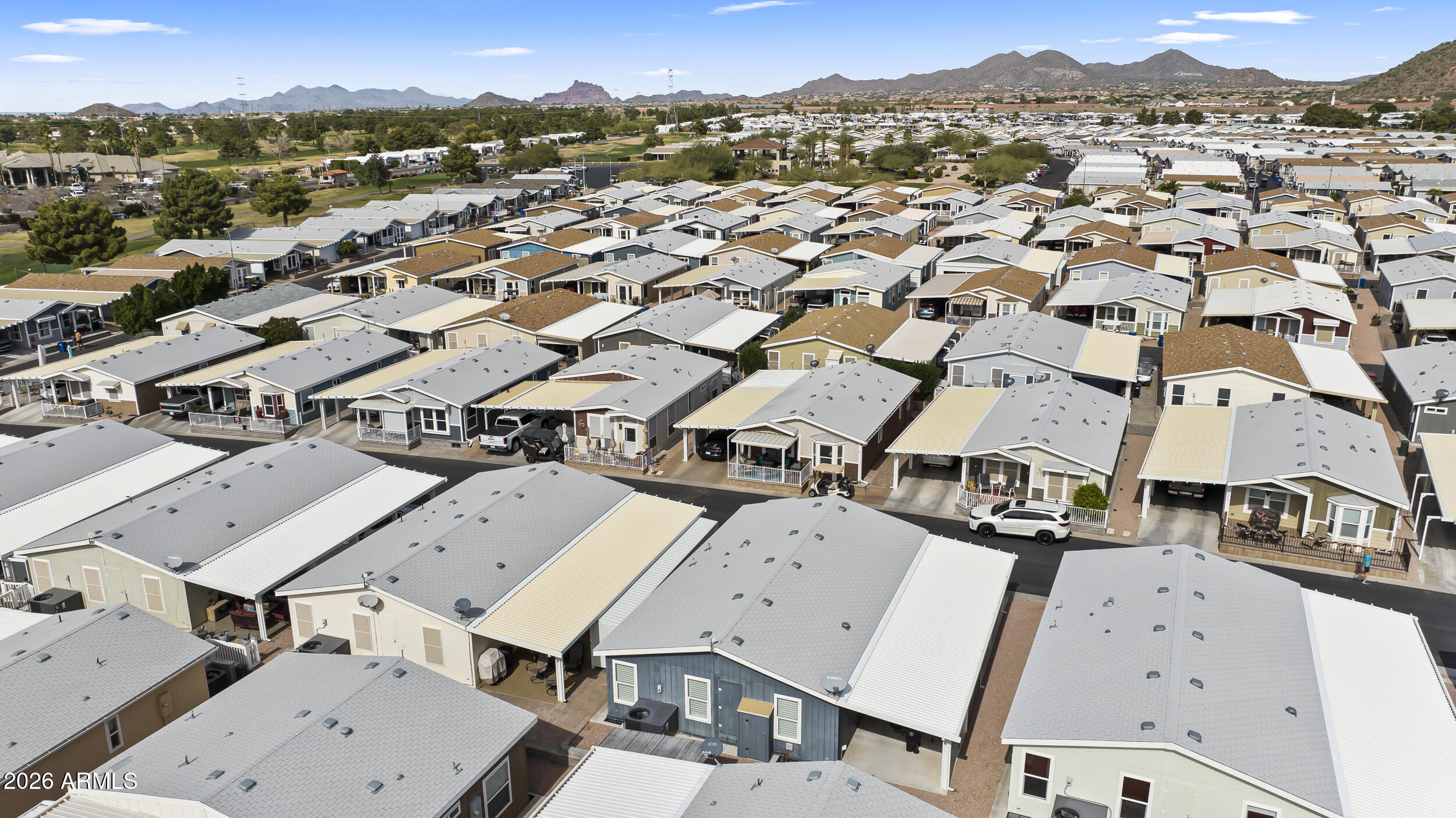 650 North Hawes Road, Unit 3509 Mesa, AZ 85207 - Photo 29 of 43 an aerial view of a city with lots of residential buildings