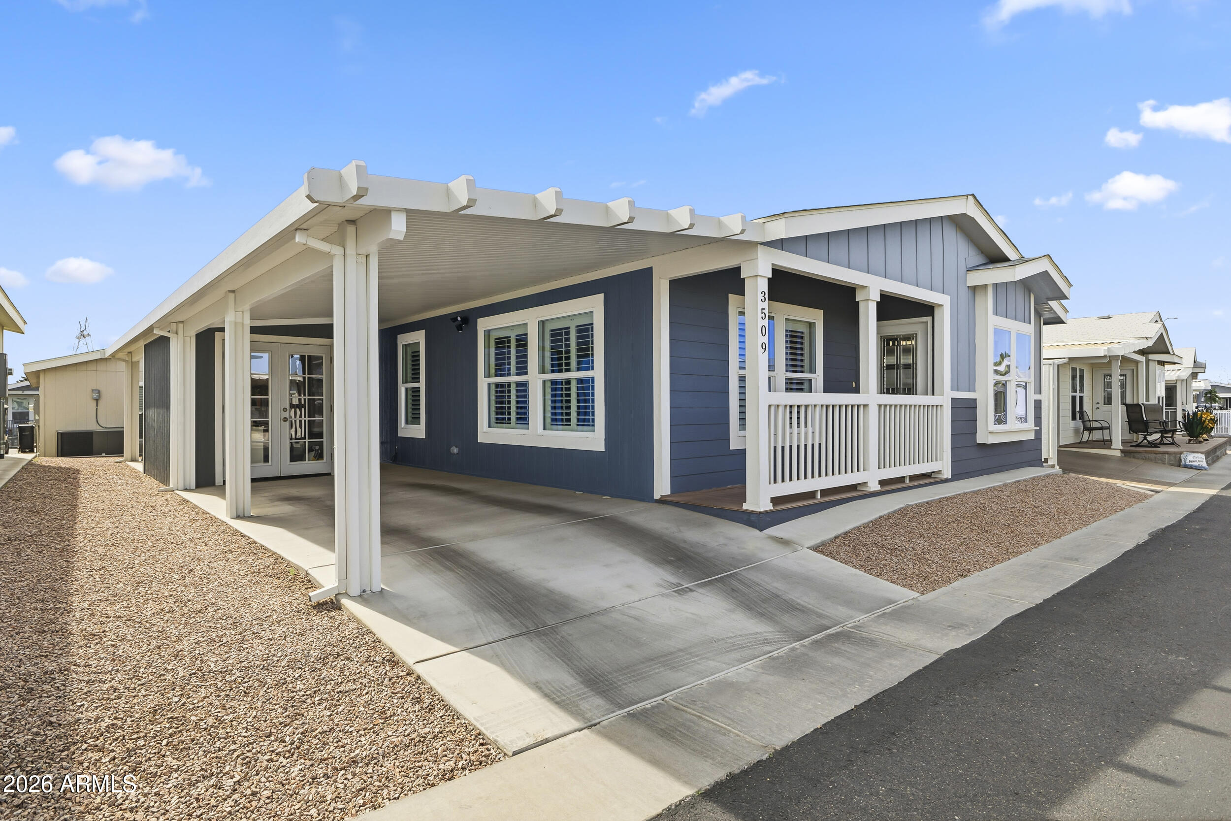 650 North Hawes Road, Unit 3509 Mesa, AZ 85207 - Photo 2 of 43 a view of a house with a patio