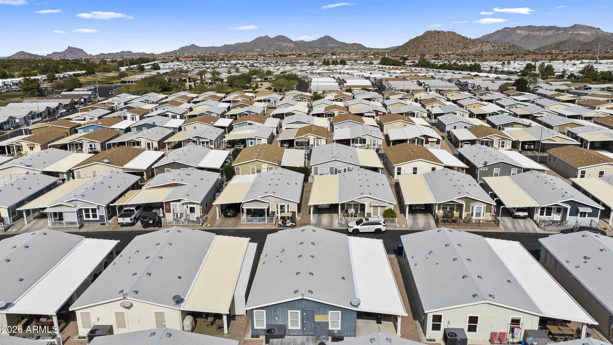 650 North Hawes Road, Unit 3509 Mesa, AZ 85207 - Photo 30 of 43 an aerial view of residential houses with outdoor space