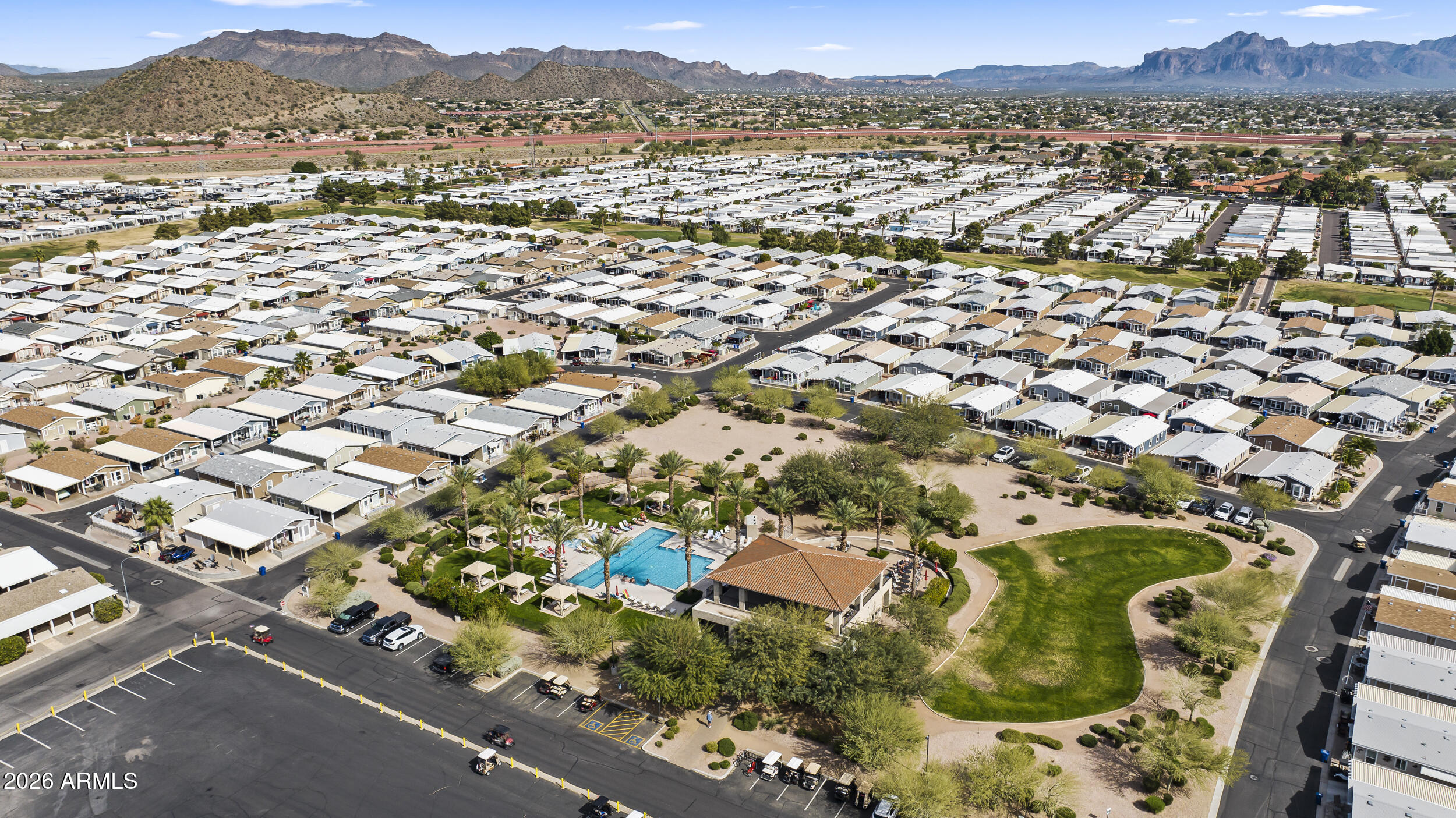 650 North Hawes Road, Unit 3509 Mesa, AZ 85207 - Photo 39 of 43 an aerial view of residential houses with outdoor space and trees