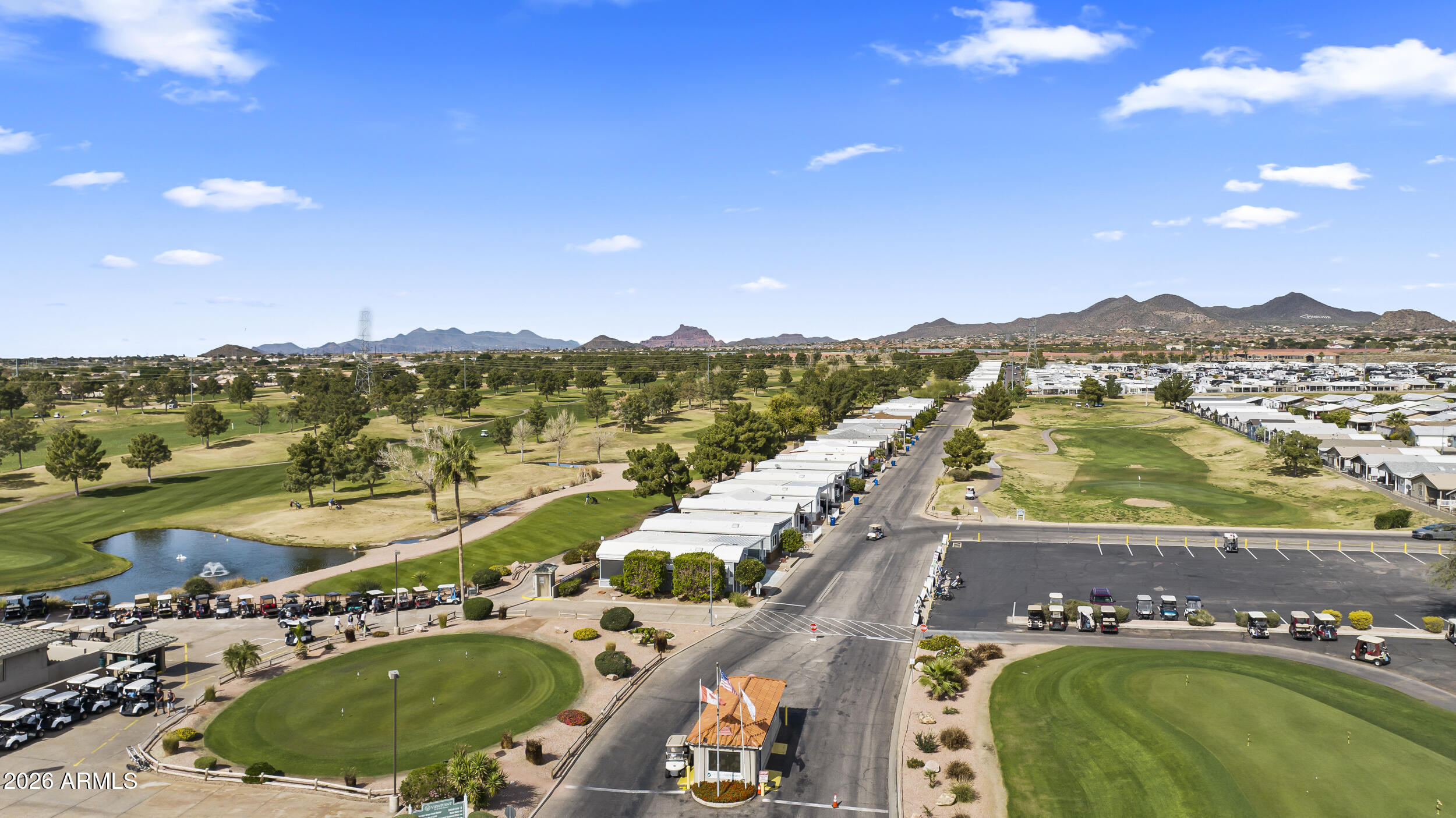 650 North Hawes Road, Unit 3509 Mesa, AZ 85207 - Photo 42 of 43 an aerial view of residential houses with outdoor space and river