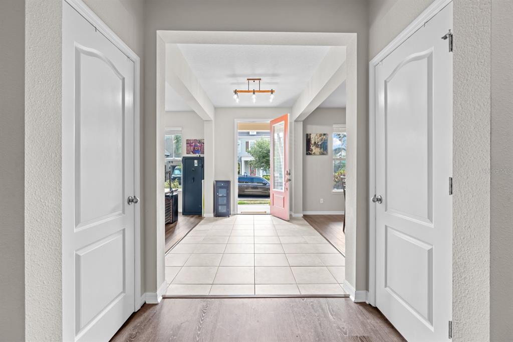 5955 Caldera Ridge Drive Lithia, FL 33547 - Photo 31 of 71 a view of a hallway with wooden floor and windows
