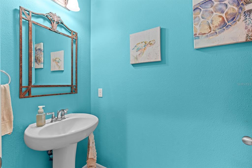 5955 Caldera Ridge Drive Lithia, FL 33547 - Photo 37 of 71 a bathroom with a sink and a mirror