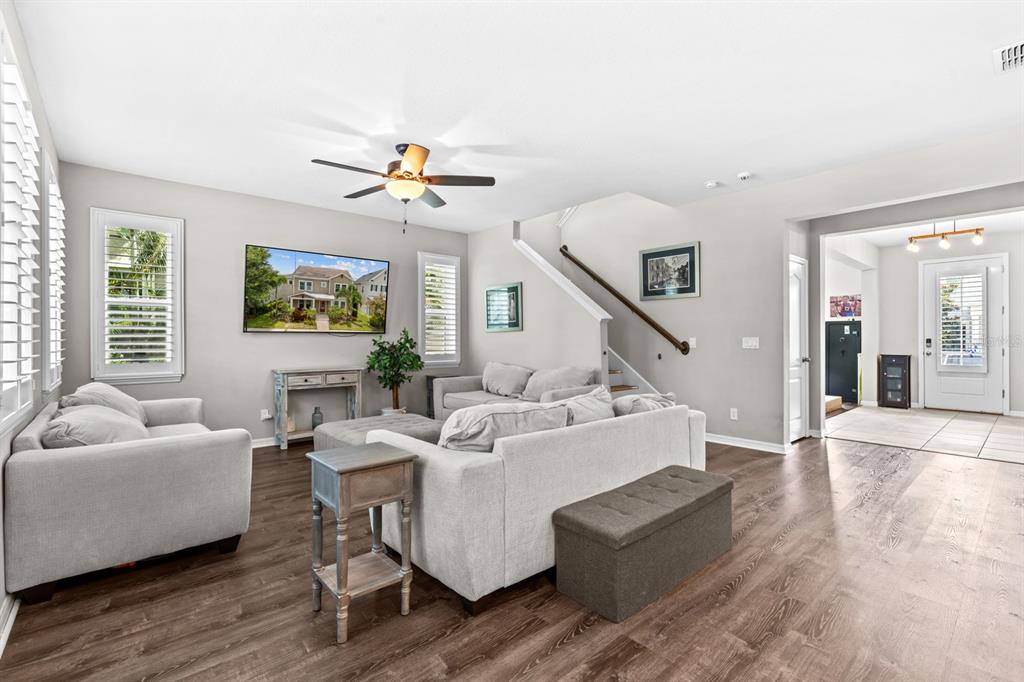 5955 Caldera Ridge Drive Lithia, FL 33547 - Photo 39 of 71 a living room with furniture and a large window