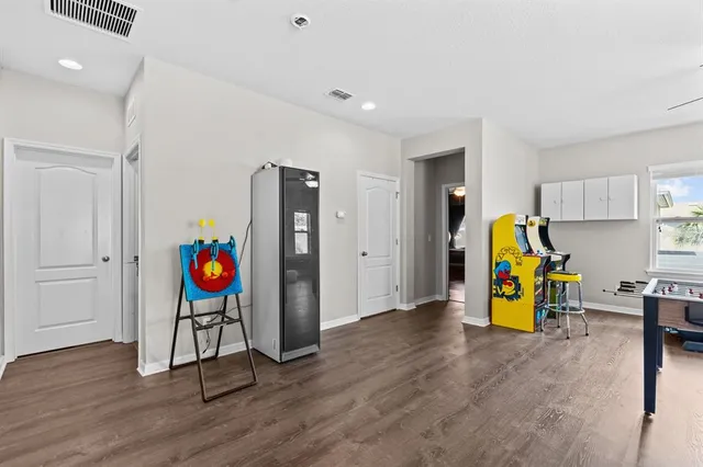a kitchen with stainless steel appliances granite countertop a sink stove and microwave