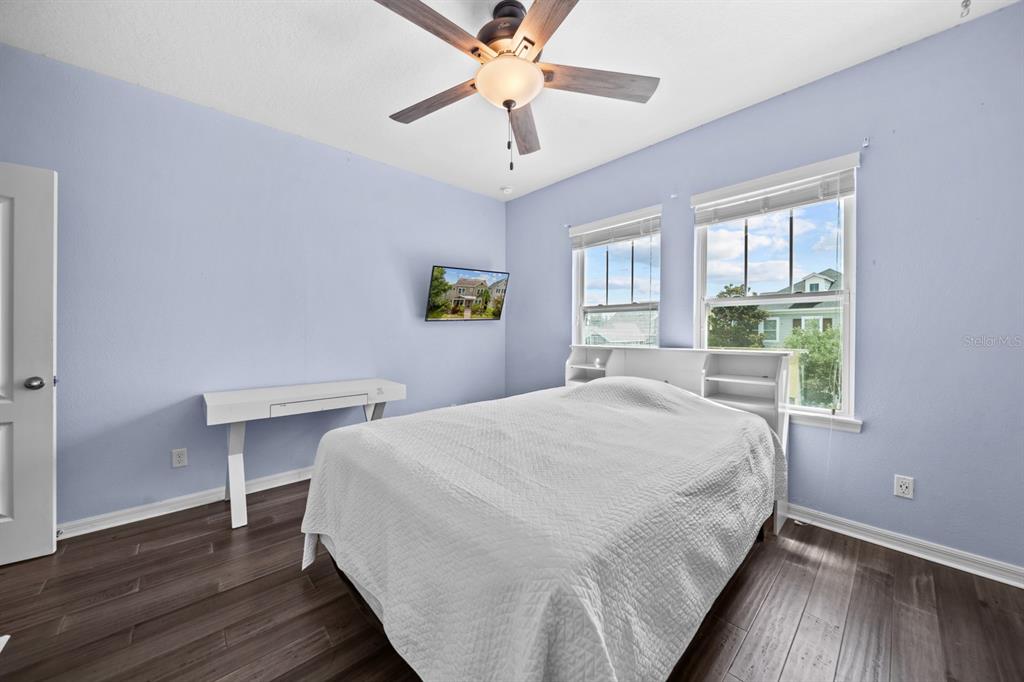 5955 Caldera Ridge Drive Lithia, FL 33547 - Photo 52 of 71 a bedroom with a bed and a window